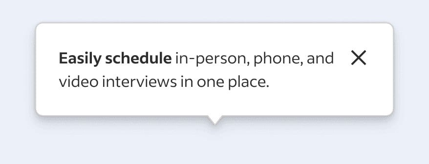A white speech bubble containing text that reads "Easily schedule in-person, phone, and video interviews in one place" with an X close button on the right.